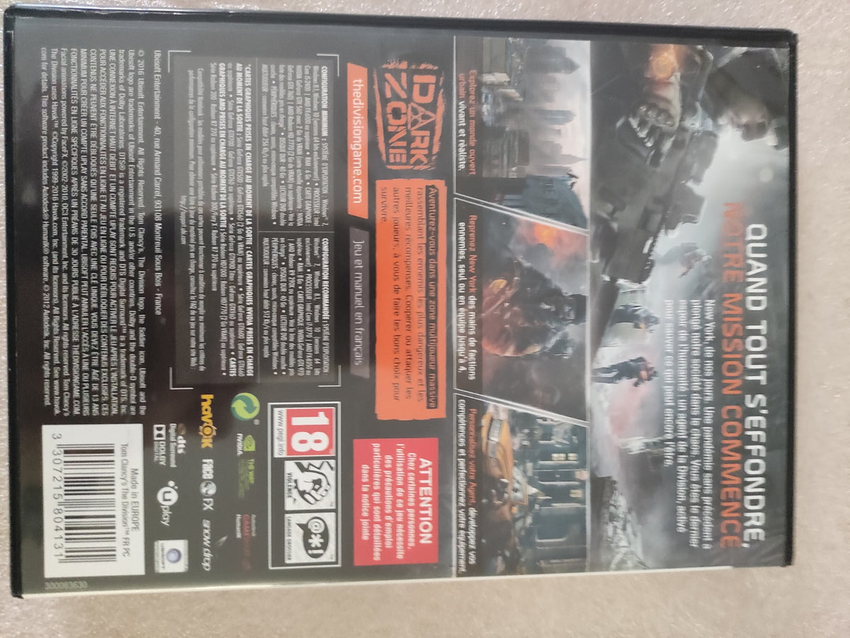 Jeu PC Tom Clancy’s The Division de Ubisoft, version française, affiché dans son boîtier avec la jaquette visible.
