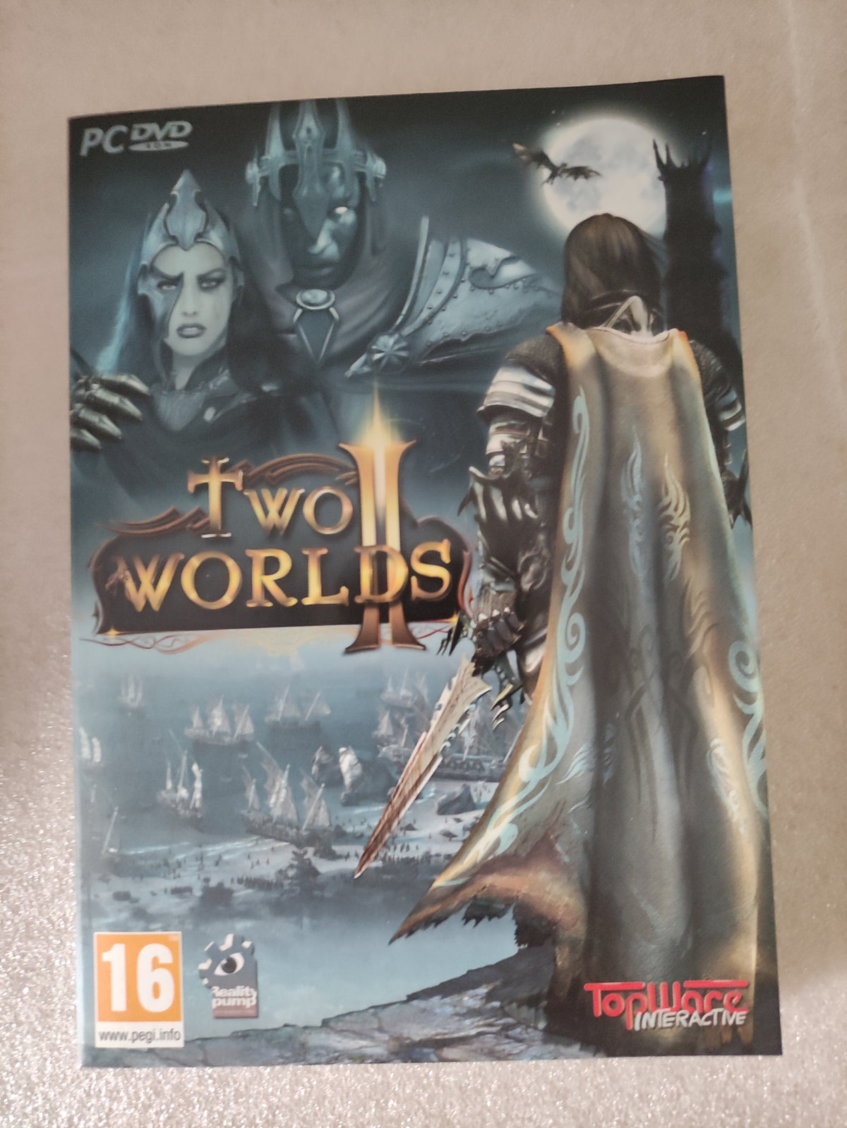 Jeu PC Two Worlds II édition française de Topware Interactive, couverture montrant l'art du jeu RPG sur la boîte.